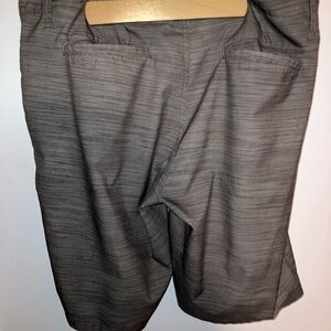 Oakley luxury golf shorts , size 34 , black and brown plaid